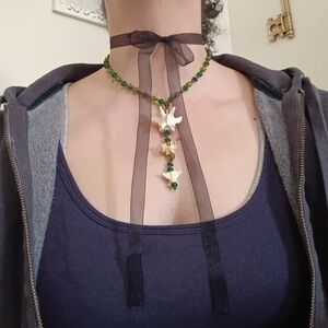 Elegant Green and White Beaded Necklace with Vertebrae